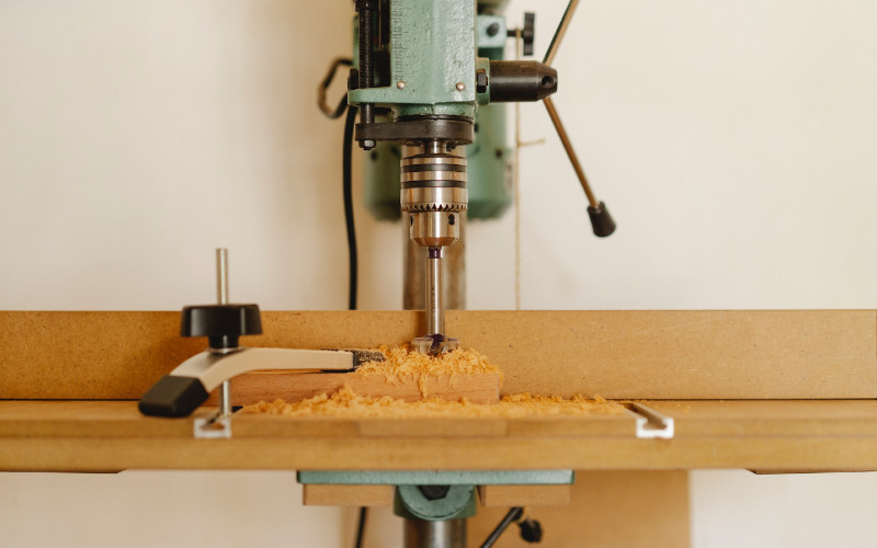 modern drill press in workshop
