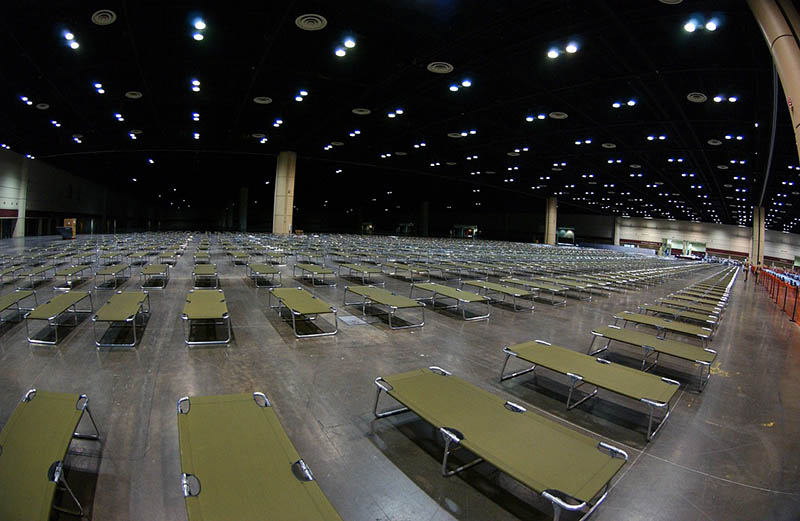 rows of cots inside a building