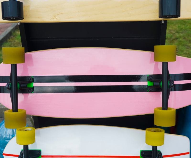 skateboard hanging on shelf