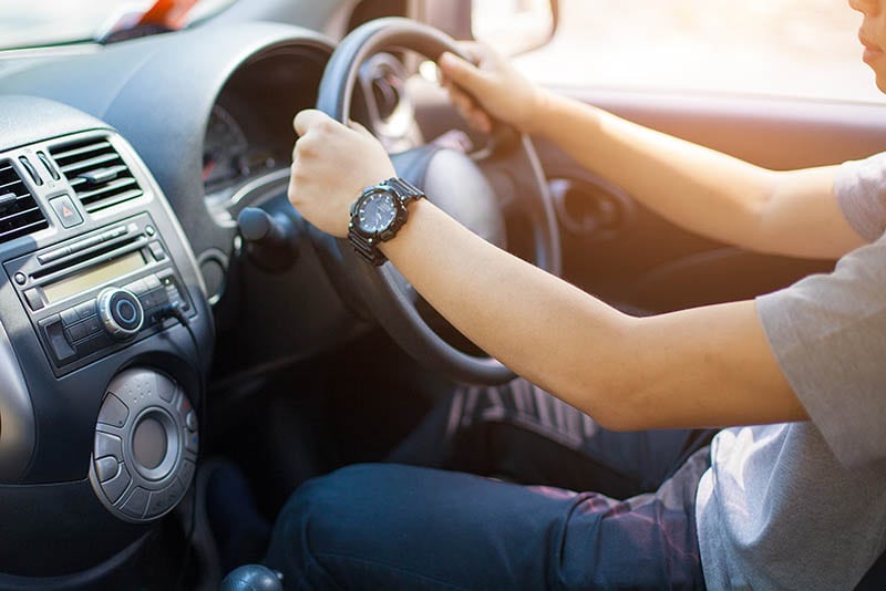 man driving right hand Car
