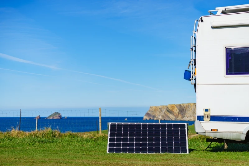 portable solar panel behind an RV