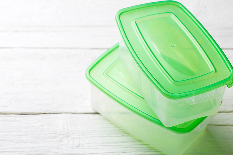 Image of two containers with green lid