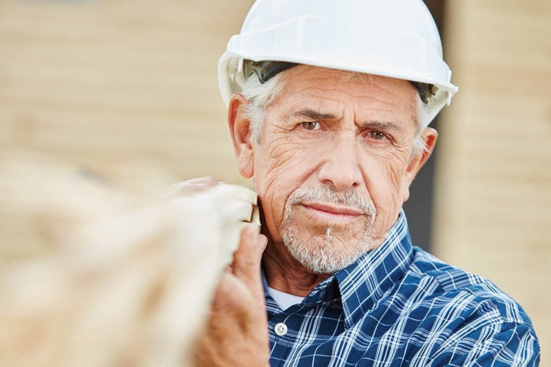 Senior as old craftsman with experience