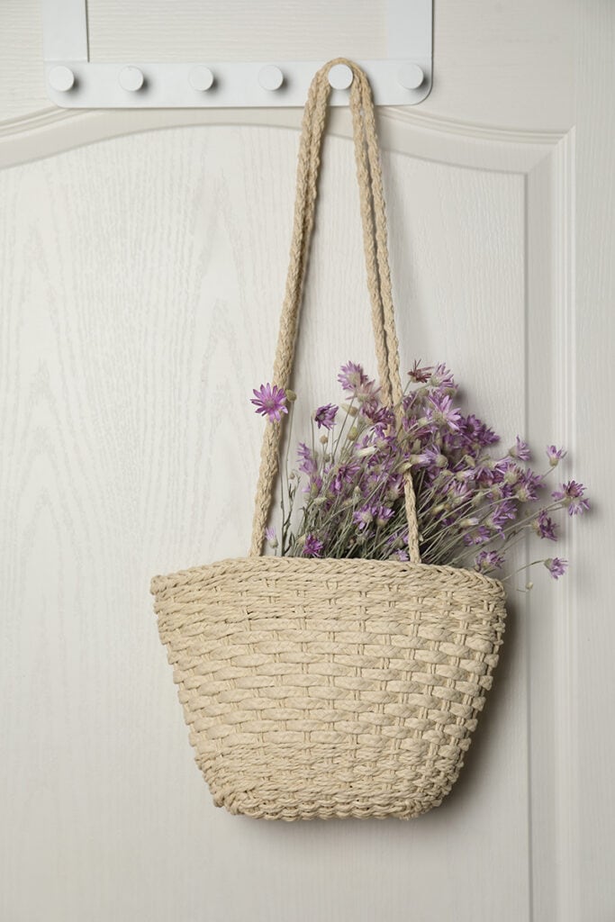beach bag hanging on back door hook