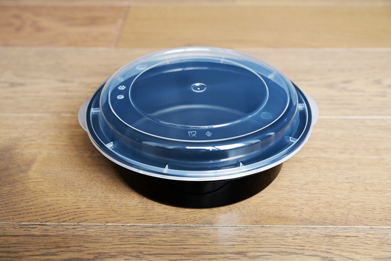 https://housegrail.com/wp-content/uploads/2023/02/black-plastic-bowl-with-clear-lid_lowpower225_Shutterstock.jpg