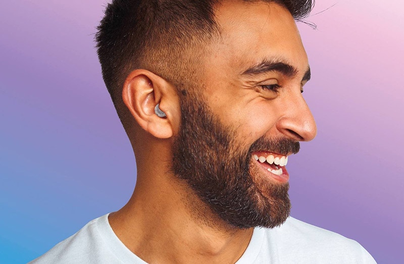 woman wearing ear plugs