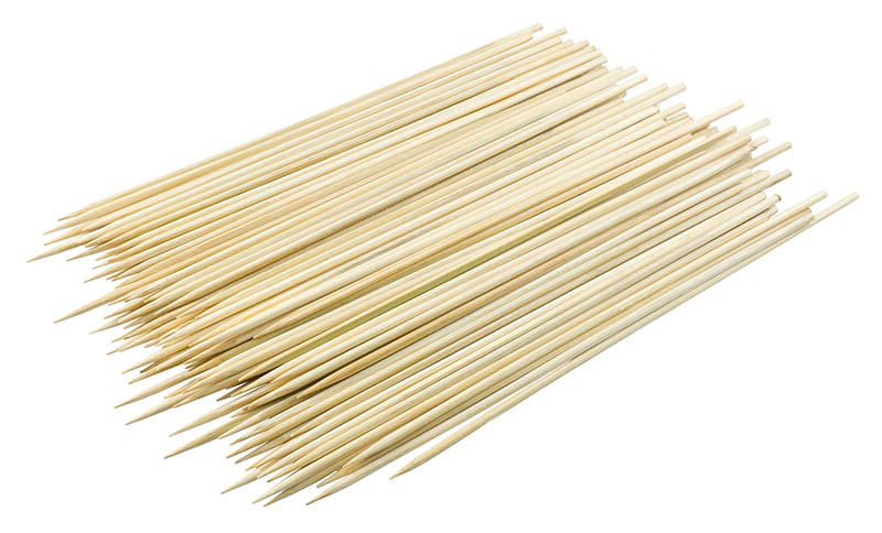 pile of wooden sticks or bamboo skewers