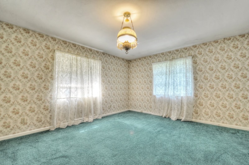 Empty Bedroom with Floral Wallpaper