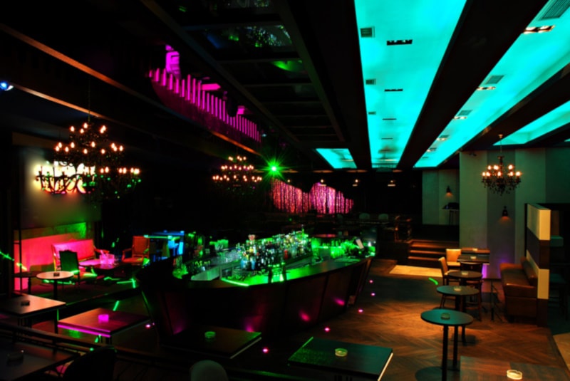 Neon-themed basement bar
