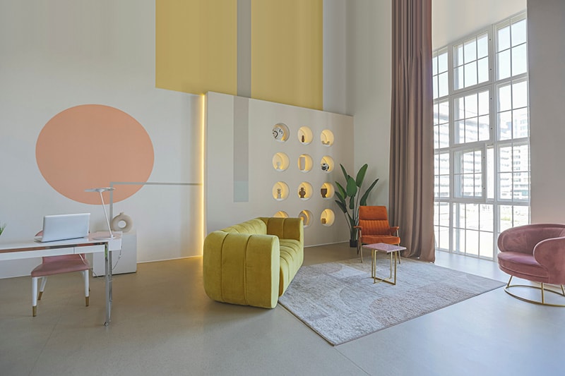 modern open-plan room interior in futuristic style in pastel colors with graphic wall decoration