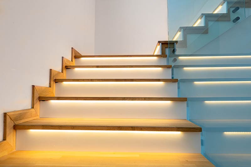 Modern illuminated wooden staircase indoor
