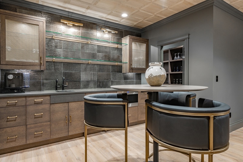 recreation room with large wooden pool table and glass doors